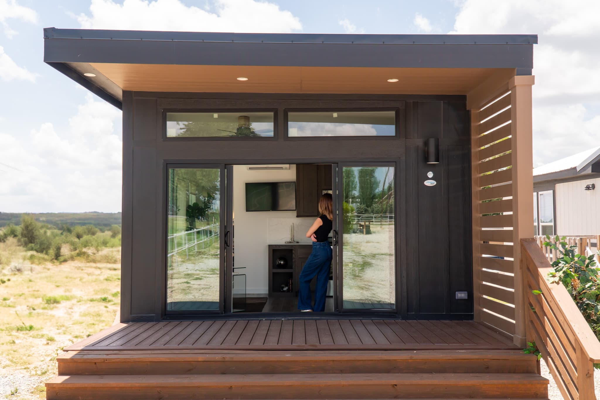 Modern dwelling unit exterior in natural setting
