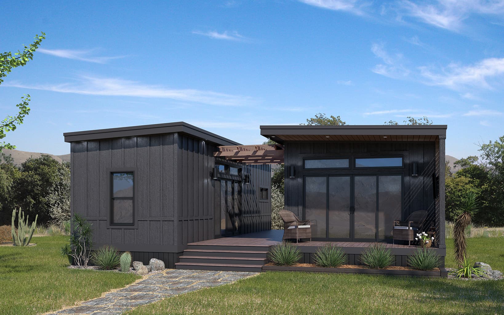 Modern park model exterior with deck and landscaped foreground